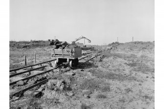 View of loaded wagons in use on cable railway.