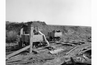 View of wagons at loading area of cable railway.