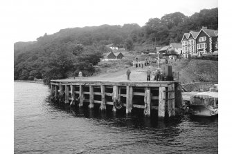 View from SW showing N pier with Inversnaid Hotel in background.