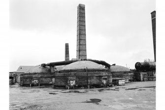 Morningside, Allanton Pipe Works
View from SE showing chimney, E beehive kiln with beehive kilns on S front of works in background