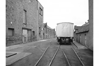 Benriach Distillery
View from WNW showing internal rail van with SSW front of maltings and kiln on the left