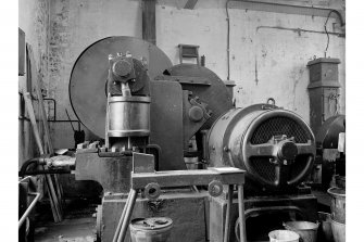 Glengarnock Steel Works, Joiner's Shop; Interior
View of three-throw hydraulic pump for Buckton tensile testing machine - powered by Westinghouse motor-