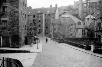 View over Water of Leith Bridge of police box, Old Tolbooth and 13 Bell's Brae