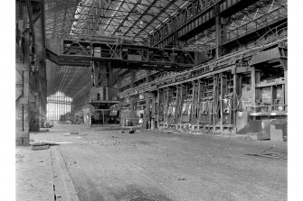 Glasgow, Clydebridge Steel Works, Interior
View showing 90 ton fixed open-hearth furnace M with charging machine in background