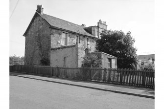 Hallside Steelworks, 1-28 Village Road, Terraced Houses
View from NW showing WNW front of numbers 1-4 and NNE front of number 1