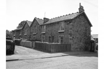 Hallside Steelworks, 1-28 Village Road, Terraced Houses
View from NE showing ESE front of numbers 11-16 and NNE front of number 11