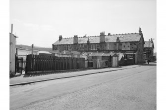 Hallside Steelworks, 1-28 Village Road, Terraced Houses
View from ENE showing ESE front of numbers 17-22 and NNE front of number 17