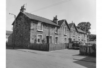 Hallside Steelworks, 1-28 Village Road, Terraced Houses
View from NNW showing WNW front of numbers 17-22 and NNE front of number 17