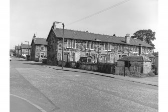 Hallside Steelworks, 1-28 Village Road, Terraced Houses
View from NW showing WNW front of numbers 23-28 and NNE front of number 23