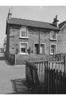 Hallside Steelworks, 1-28 Village Road, Terraced Houses
View from NW showing WNW front of numbers 17 and 18