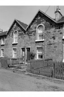 Hallside Steelworks, 1-28 Village Road, Terraced Houses
View from W showing WNW front of numbers 19 and 20