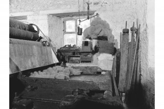 Islay, Redhouses, Woollen Mill; Interior
View of the feeding table for the carding engine