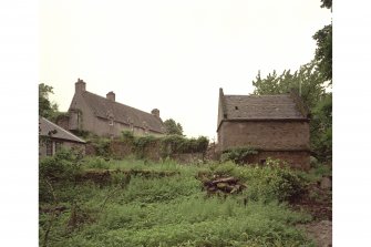 Doocot and Malleny house, view from W