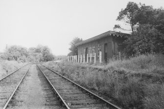 Currie, Currie Station.
View along tracks of platform from North East.