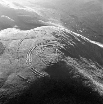 Oblique aerial view centred on Woden Law fort.