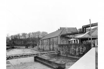 Windygates, Cameron Bridge Distillery
View from WSW showing curved WNW front of workshops with railway bridge in background