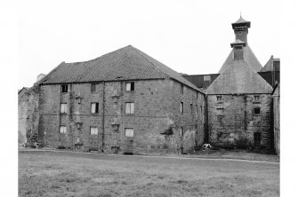 Windygates, Cameron Bridge Distillery
View from SSW showing SW front and part of SE front of N malting block and SW front of W malt kiln with E malt kiln in background