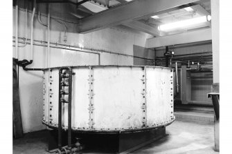 Glenfarclas Distillery, Interior 
View showing old cast-iron tank
