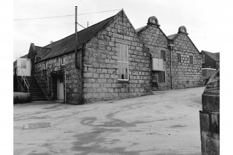 Oldmeldrum, Distillery Road, Glengarioch Distillery
View from WNW showing WSW front and part of NNW front of cooperage and WSW front of Duty Free Warehouse Number 5