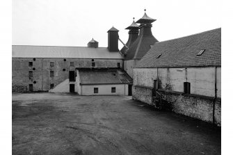 Islay, Ardbeg Distillery
View of maltings (l) and malt deposit