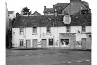View of 1-9 Lower Bridge Street, Stirling, showing houses and shops including the Cosy End Cafe.
View from ESE showing part of ESE front