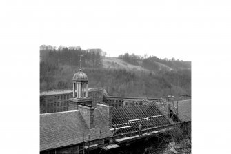 New Lanark, New Buildings
View from E showing cupola and roof repairs with mill number 2 and mill number 1 in background