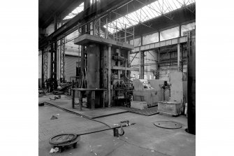 Paisley, MacDowall Street, Caledonia Engineering Works, Interior
View of boiler shop looking SE showing Hugh Smiths vertical shell bender (1 roll, 65cm diameter (26'') x 310cm long (10' 0'') with floor pockets for rollers on the right