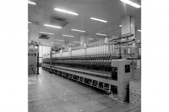 Paisley, Ferguslie Thread Mills, No. 3 Spinning Mill; Interior
View of ring spinning machine in 2nd flat