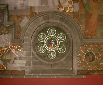 Interior. South chapel, stained glass window depicting the parable of the lost sheep.