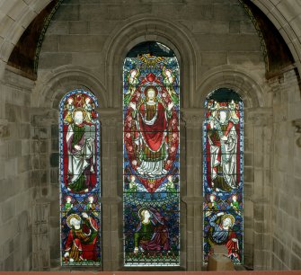 Interior. South chapel, stained glass window showing Christ with Moses and Elijah, the Transfiguration.