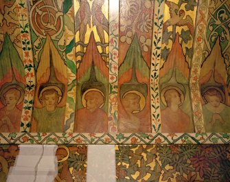 Interior. North chapel, detail of mural frieze depicting heads of angels.