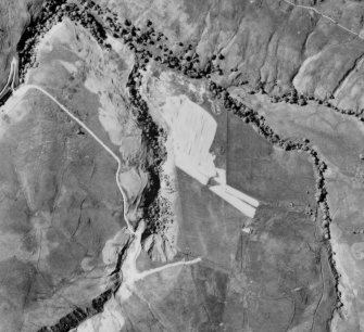 Oblique aerial view of Third and Second Inchna Burn centred on the remains of archaeological landscapes, taken from the SW.