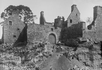 View of castle with men digging