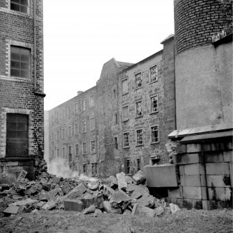 Glasgow, 21-31 Bishop Street, Bishop Garden Cotton Mill
View from WSW showing WNW front of mill with base of chimney in foreground