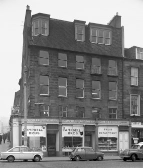 North elevation of 60 Queen Street, showing Campbel Bros butcher shop windows, and parked cars