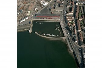 Oblique aerial view from West centred on Newhaven Harbour.