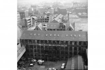 Glasgow, 335 St Vincent Street, Merino Spinning Mill
View from N showing NNE front of spinning mill with grain store and Bishop Garden Cotton Mill in background