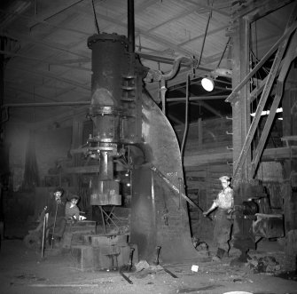 Coatbridge, 14 Jackson Street, Anderson's Engineering Works, Interior
View showing man working steam hammer
