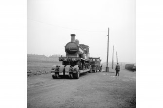 Glasgow, Govan Goods Yard
View showing locomotive number 49 on trailer with trucks on right