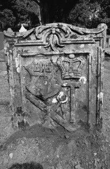 Colmonell churchyard.
Headstone commemorating William Affleck and Andrew Affleck, 1776. Stonemason's emblems in shield; crown and hammer for blacksmith.