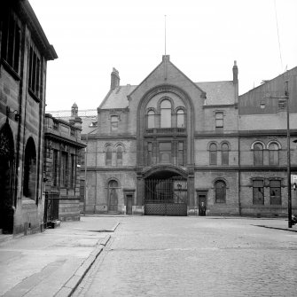 View of Hyde Park Locomotives Work, Flemington Street, Glasgow, from W showing main entrance on Ayr Street of Hyde Park Locomotive Works with Springburn District Library and the Vulcan Hall on left.