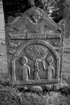 Logierait Parish Church.
Gravestone commemorating William Husband, d.1784. Winged soul over Adam and Eve and emblems of mortality.