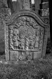 Logierait Parish Church.
Gravestone commemorating John McLaren, d.1769. Angels, Adam and Eve and scales.
