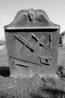 Dunbarney Old Parish Church and graveyard
Rear face of gravestone dated 1809 showing tools of a joiner.