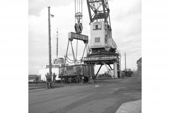 Ayr Harbour
View from ESE showing crane lowering truck