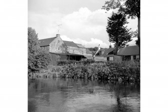 Riccarton Mill
View from W showing part of SW front of mill with cottages on right