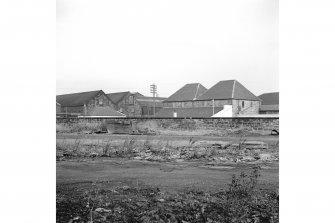 Paisley, Saucel Street, Saucel Distillery
View from S showing kilns and workshop roof on right with warehouses on left