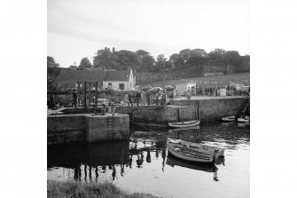 St Andrews Harbour, Rolling Suspension Footbridge
View from ENE showing NNE front of bridge with store in background