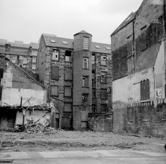 Glasgow, 335 St Vincent Street, Merino Spinning Mill
View from SW showing part of SSW front of mill with grain store on right