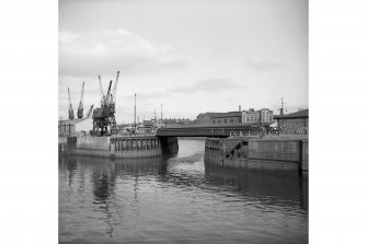 Glasgow, Kingston Dock
View of dock entrance showing swing bridge and travelling crane